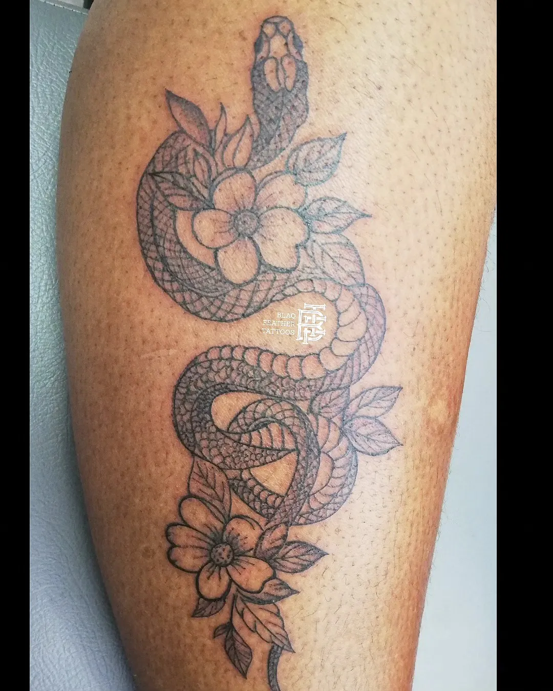 Serpent in bloom — Fine line by BlaQ Feather